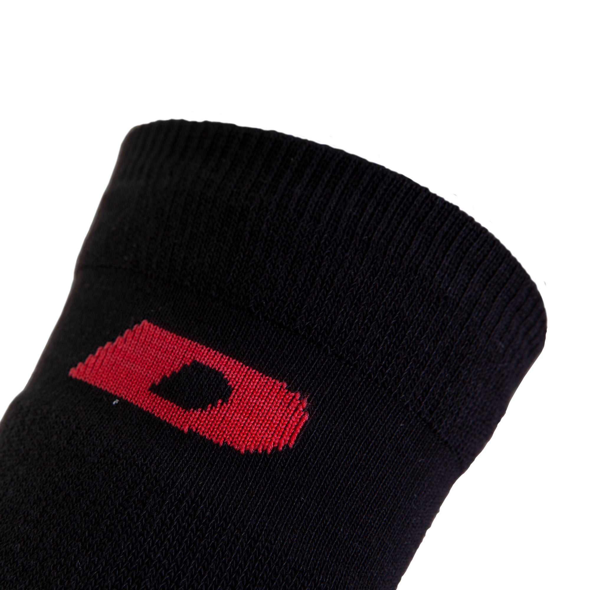 black socks with red dynapac d logo closeup