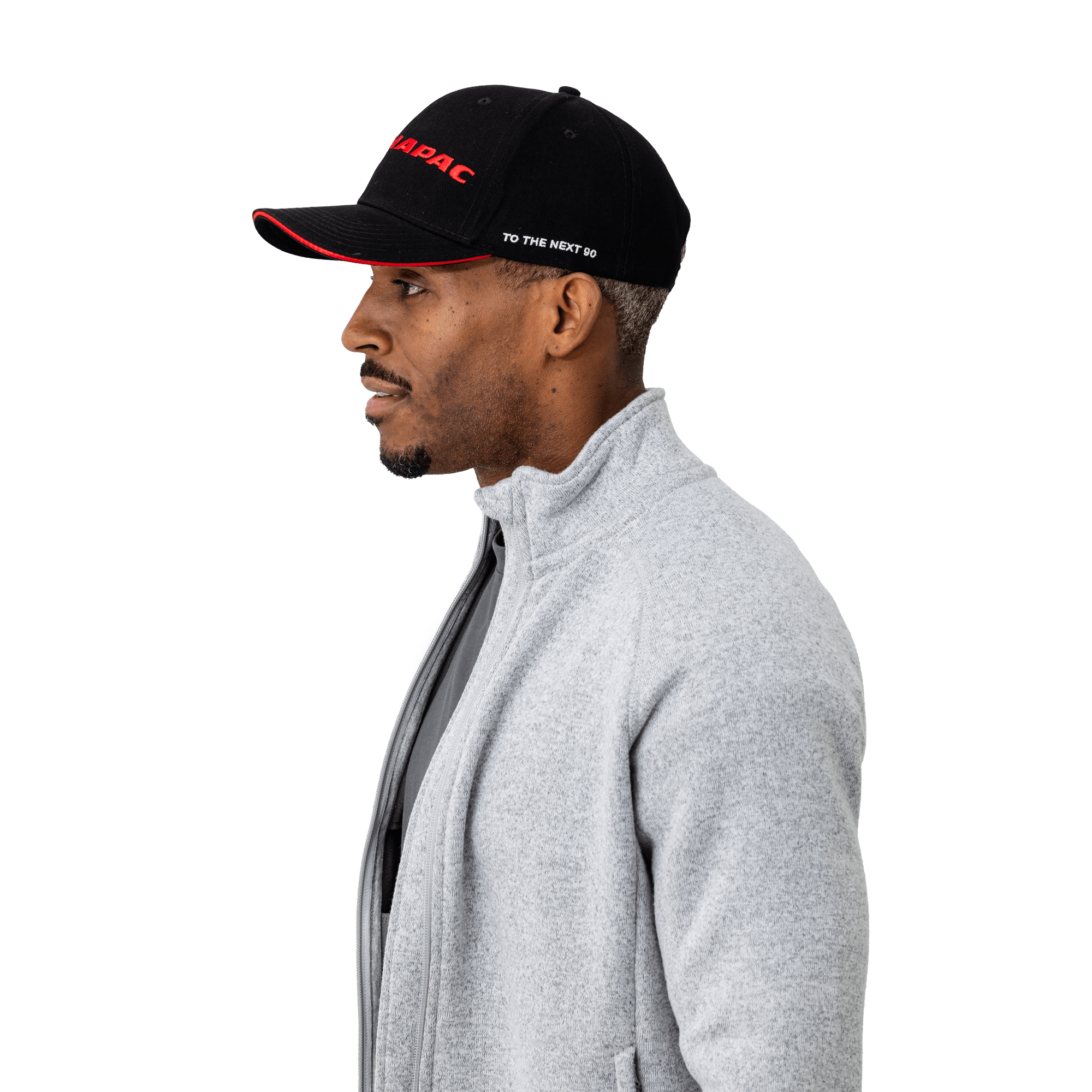 black dynapac cap on male model from side